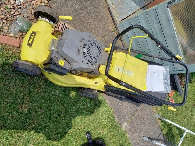 Preview of the first image of challenger petrol mower in working order.