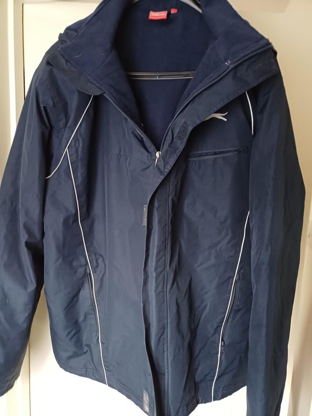 Preview of the first image of Men's waterproof Slazenger coat.