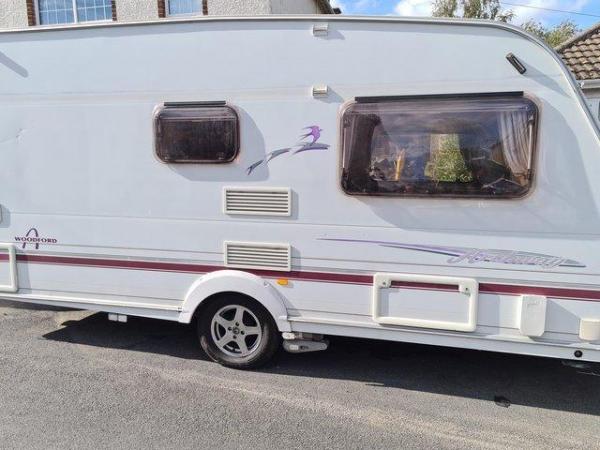 Image 1 of Swift Archway Woodford touring caravan with motor mover