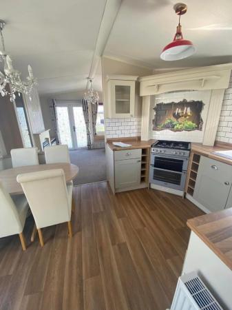 Image 2 of ONLY £38k! Quality Holiday Home.£13k decking and more.Wow!