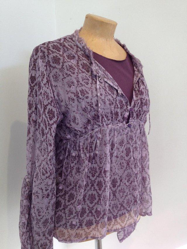 Preview of the first image of DKNY silk blouse size 8.  Unworn as new.