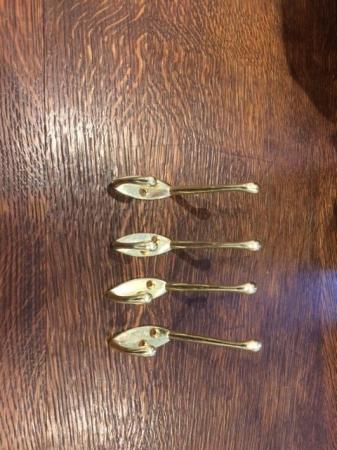 Image 1 of 2 Large Brass Robe Hooks and 4 small brass robe hooks