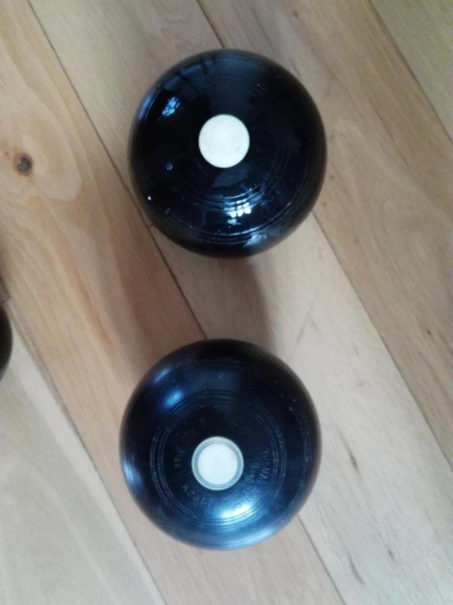 Preview of the first image of Three Thomas Taylor bowling balls,.