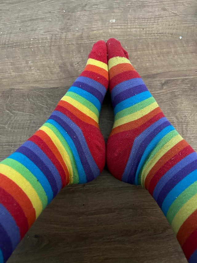 Preview of the first image of Ladies worn long rainbow socks.
