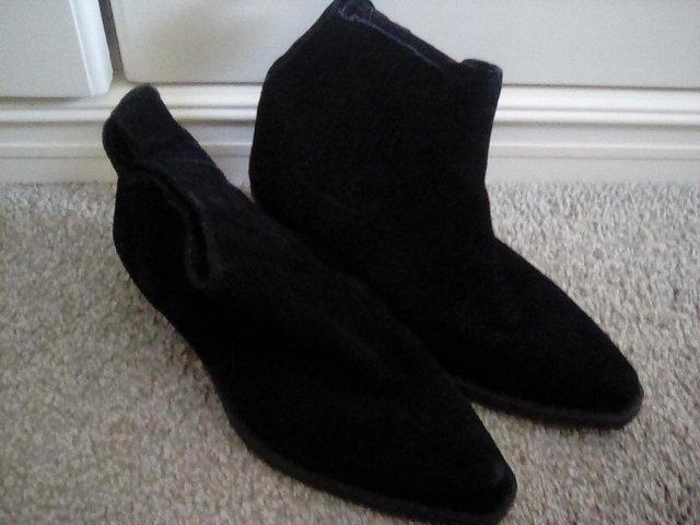 Preview of the first image of Ladies Black suede Western boots.