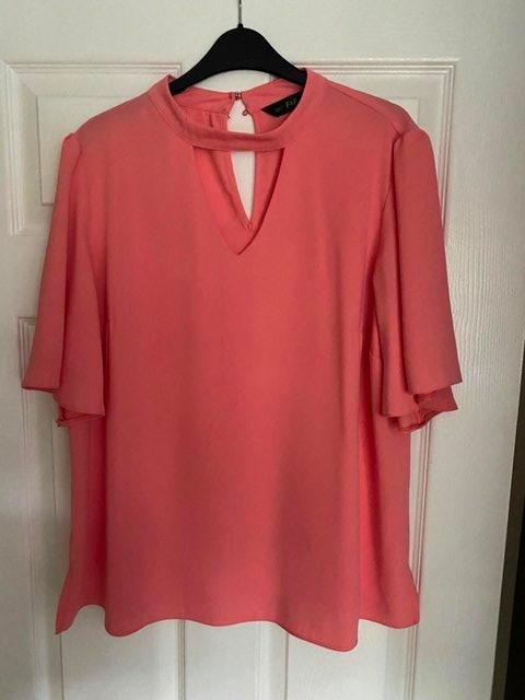 Preview of the first image of Ladies Top Blouse in peachsize 18.