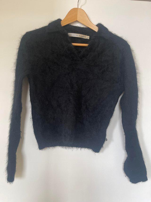 Preview of the first image of Fenn Wright & Manson black angora jumper.