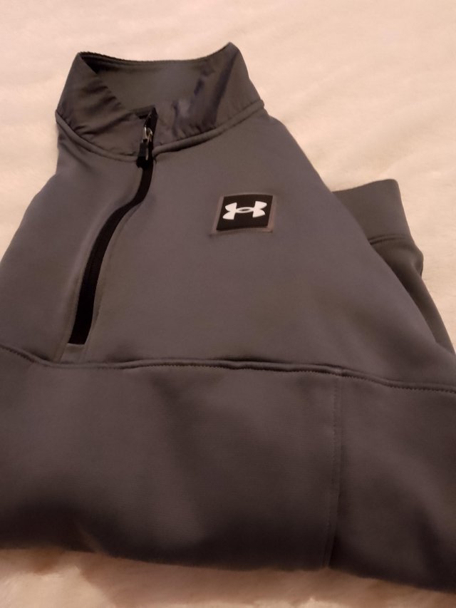Preview of the first image of Mens medium/large underarmour long sleeve.