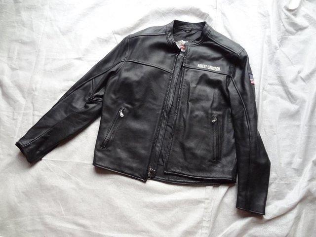 Preview of the first image of Unworn, Harley Davidson American Legend black leather jacket.