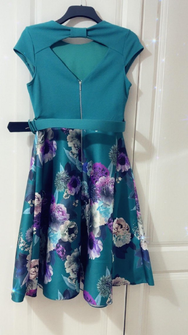 Preview of the first image of Dorothy Perkins floral party dress.