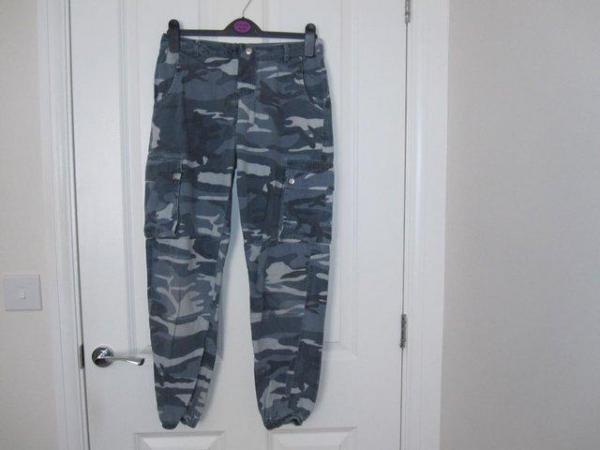 Image 1 of Teenage/girls camo trousers from New look