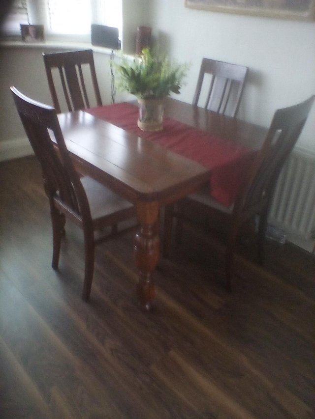 Preview of the first image of Extending Table and 4 chairs for sale.