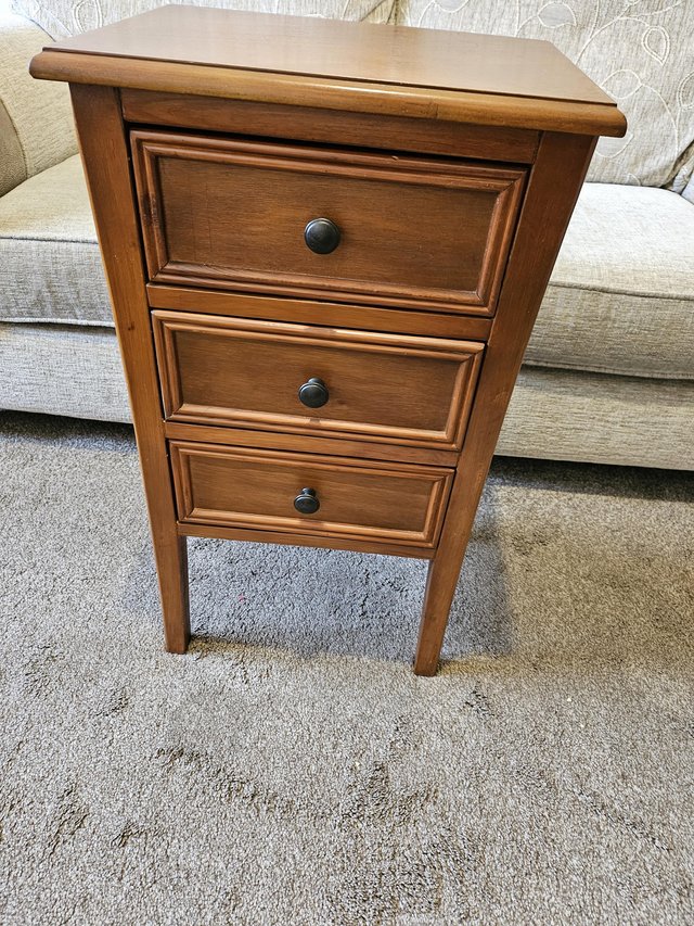 Preview of the first image of ANTIQUE BROWN SIDE CABINET.