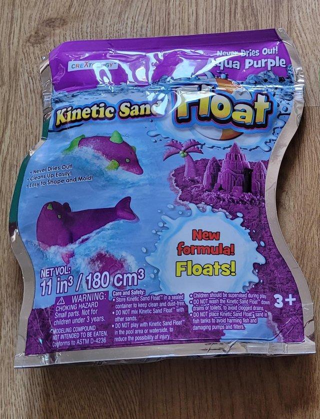 Preview of the first image of Kinetic Sand - Mouldable Sensory Play Sand, Purple.