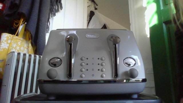 Preview of the first image of DELONGHI 4 SLICE TOASTER - BRAND NEW.
