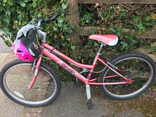 child's bicycle complete with helmet - £40 ono
