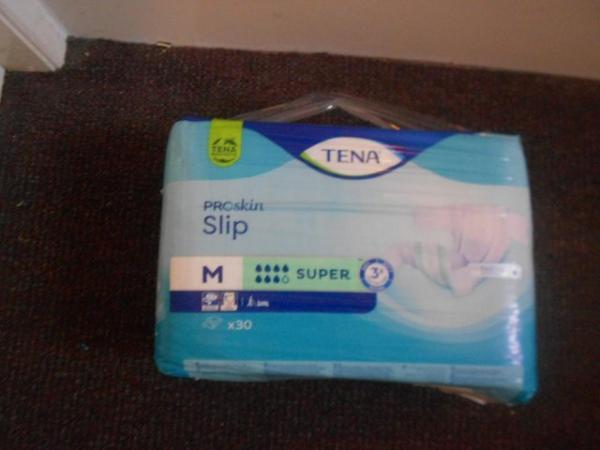 Image 2 of TENA ADULT UNISEX INCONTINENCE NAPPIES.