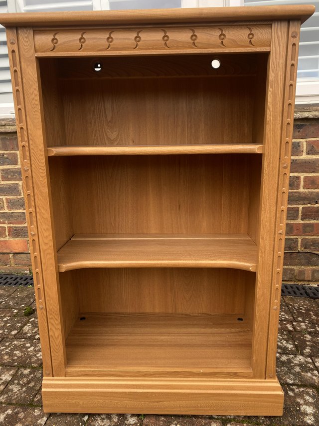 Preview of the first image of Ercol Mural Light Elm Open Music Storage Display Cabinet.