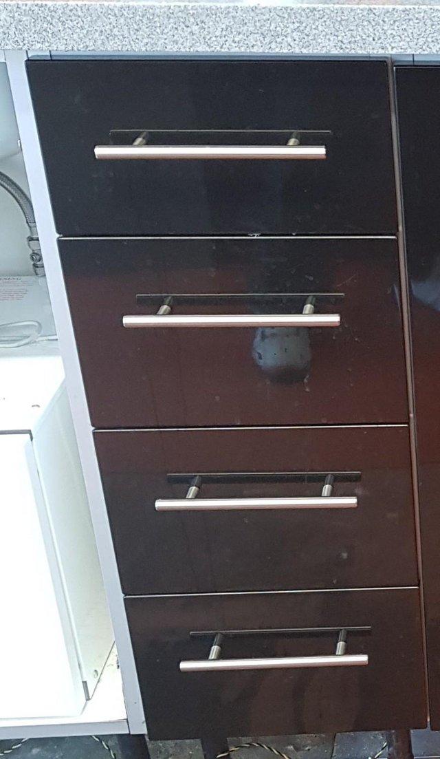 Preview of the first image of 4 black gloss kitchen drawers £15 each.