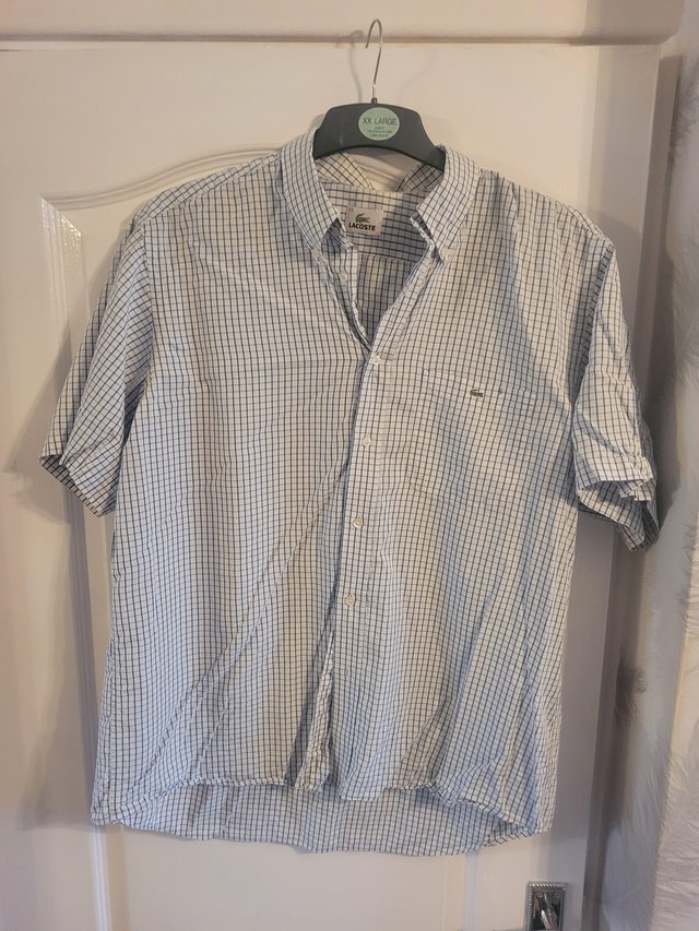 Preview of the first image of La coste short sleeve shirt.