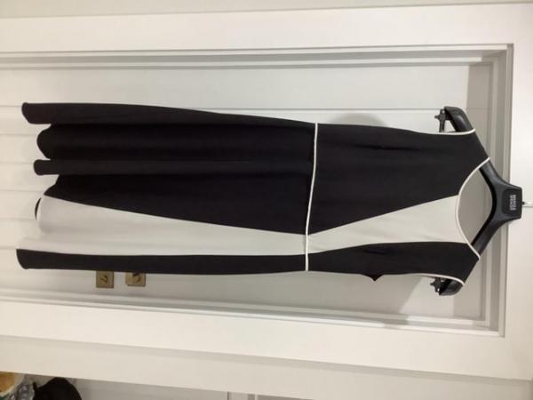 Image 1 of Black andWhite loose fitted skirted dress M&Ssize 12