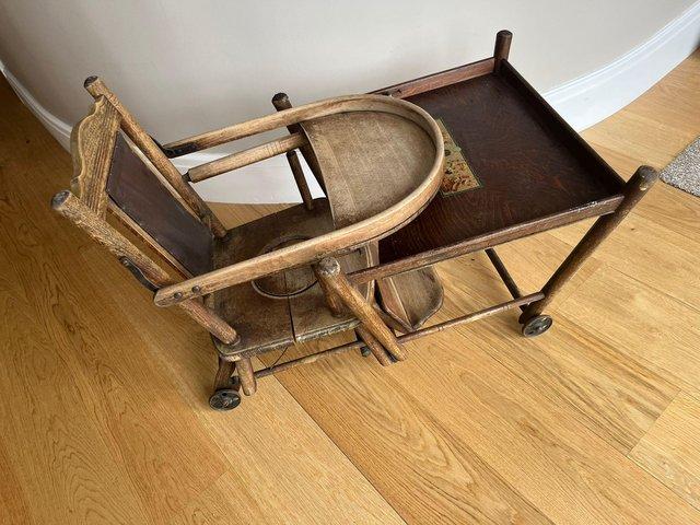 Preview of the first image of Early Victorian highchair which converts to a walker.
