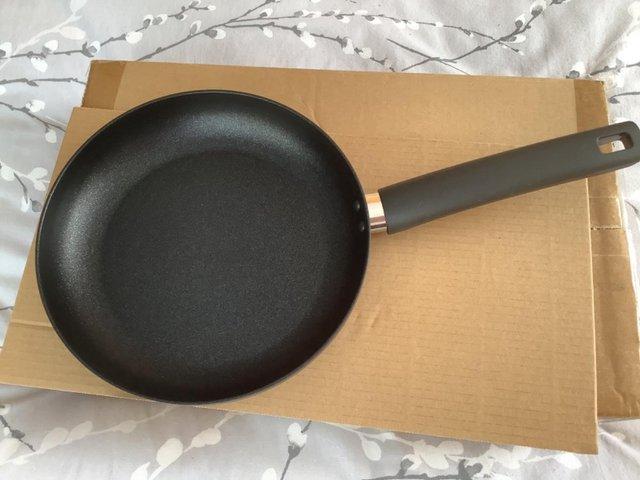 Preview of the first image of New Induction Frying Pan Still Boxed.
