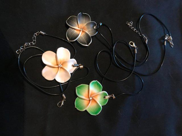 Preview of the first image of Clay Flower Necklace, 3 colours available £3 each.