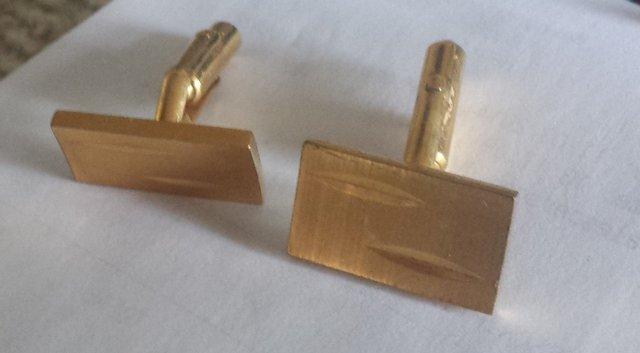 Preview of the first image of Gold plate cufflinks.