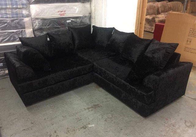 Preview of the first image of Ferguson corner sofa in black crushed velvet.