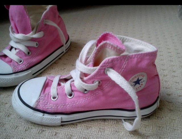 Preview of the first image of pink Hi Top Converse size UK 9 infant.