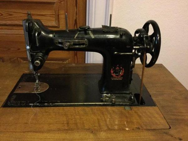 Image 2 of Antique sewing machine in custom-made table