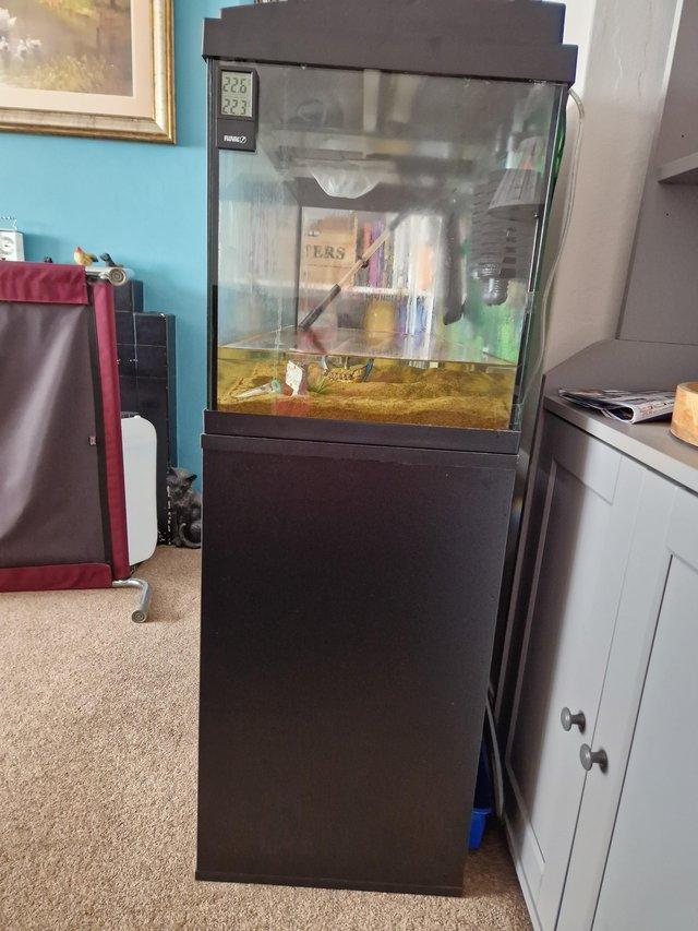 Preview of the first image of Aquatropic 80L Aquarium and stand.