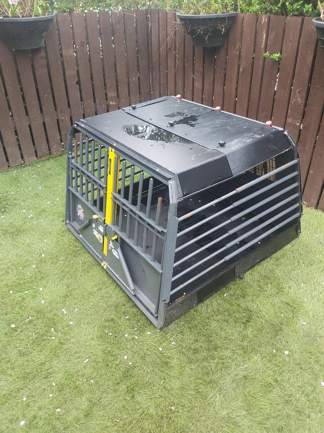 Preview of the first image of Professionally fabricated car/dog crate.