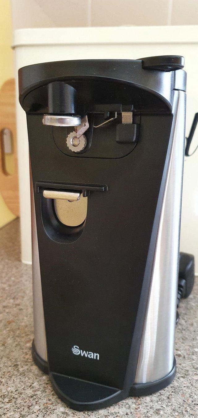 Preview of the first image of Electric can opener made by Swan..