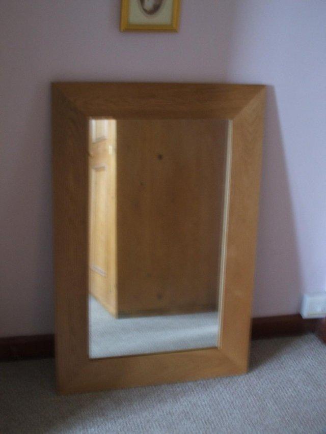 Preview of the first image of Oak Furniture Land oak wall mirror.