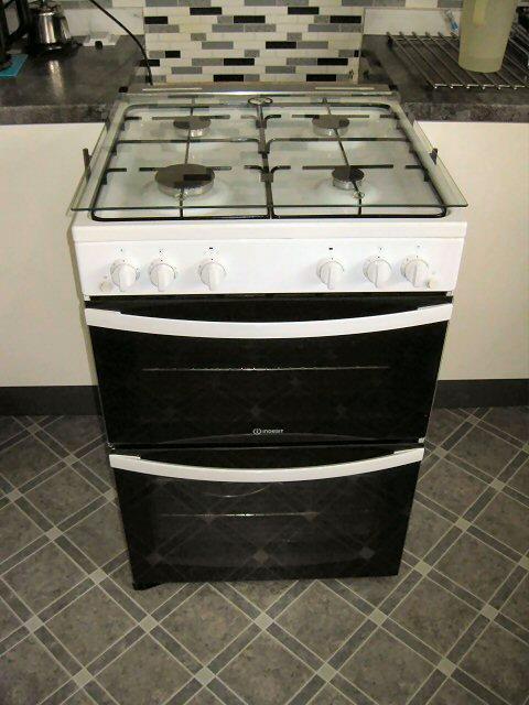 Preview of the first image of INDESIT DOUBLE OVEN GAS COOKER.