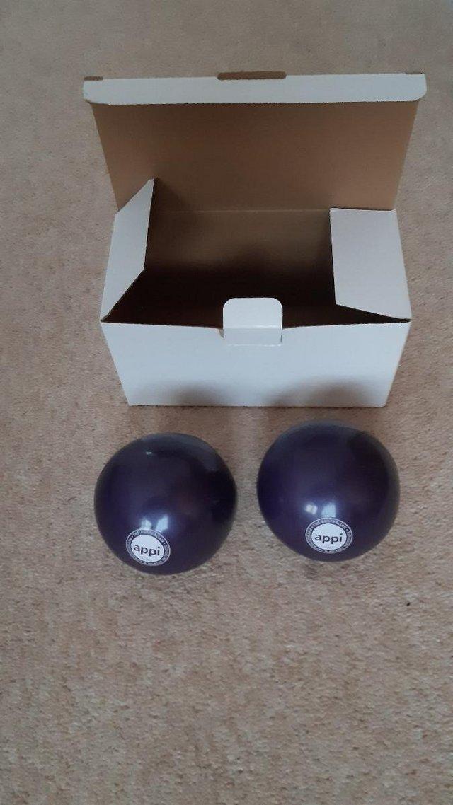 Preview of the first image of Pilates DVD and weighted balls.