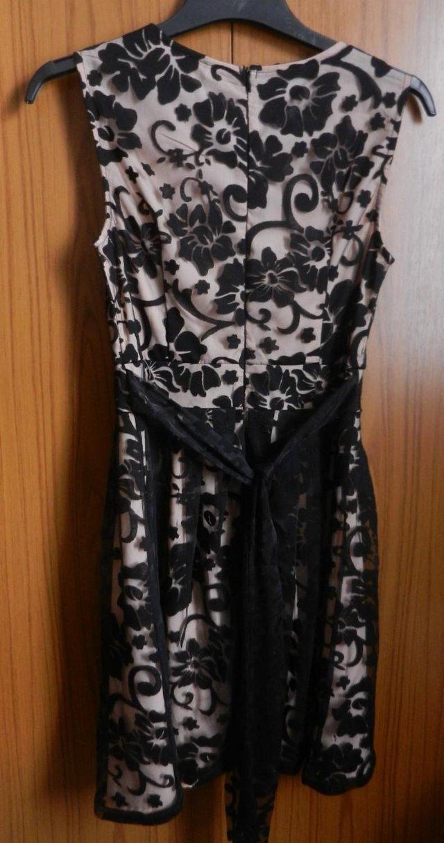 Preview of the first image of Yumi Black Floral Lace Sleeveless Dress Size UK  6.