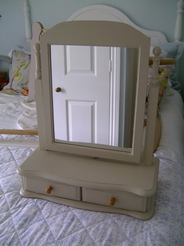 Preview of the first image of Woden tilt mirror with drawers.