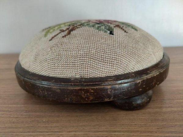 Image 1 of Antique small embroidered circular footstool.