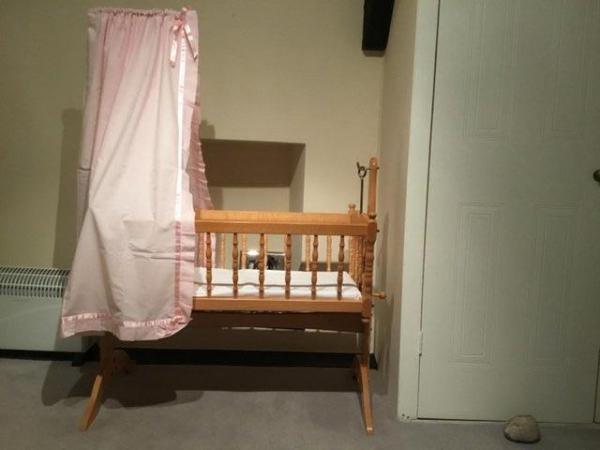Image 2 of Wooden swinging crib in lovely condition