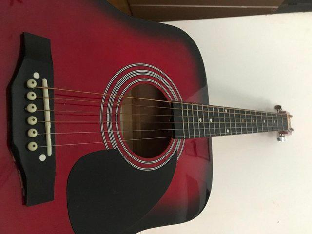 Preview of the first image of full size falcon acoustic guitar.
