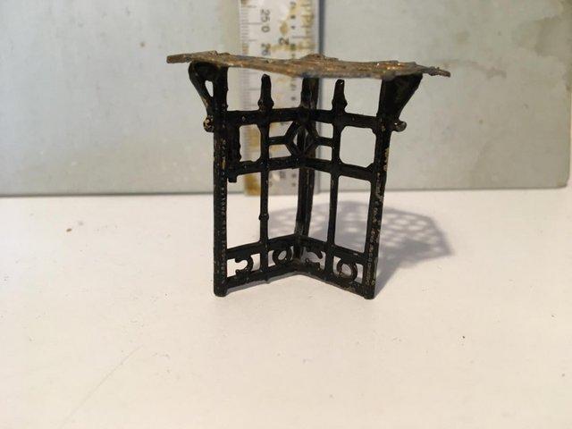 Preview of the first image of Ornate metal table for dolls house.