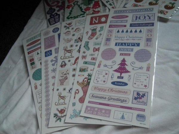 Image 2 of 10 sheets of stickers & 2 sheets Christmas chipboard shapes