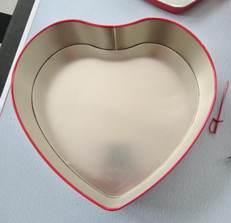 Image 21 of Red Heart Shaped Tin with Party Accessories.