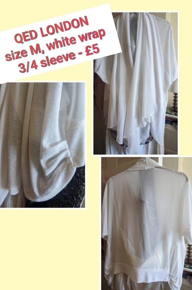 Preview of the first image of Ladies White wrap - size M - used.