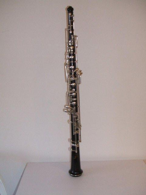 Preview of the first image of Italian Silver Plated Wooden Oboe on Thumbplate System.