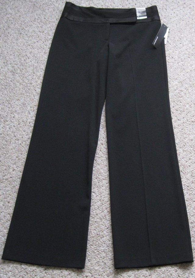 Preview of the first image of NEW Trousers in different colours, size 10.