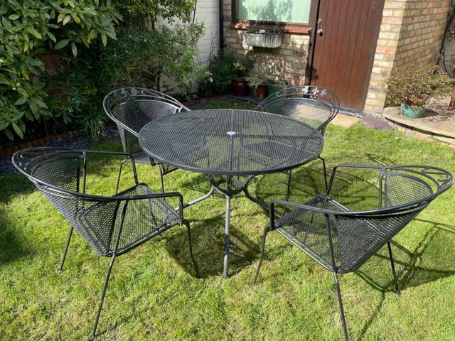 Preview of the first image of Black Outdoor Patio Garden Furniture Round Table & 4 Chairs.